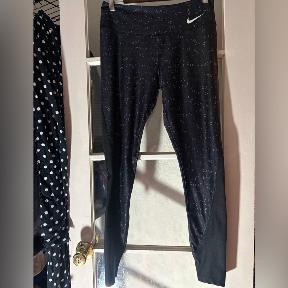 Nike Black Leggings with Subtle Logo Design
